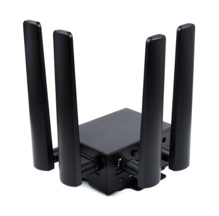 The overlay in a black housing with 4 antennas lies on a white background.