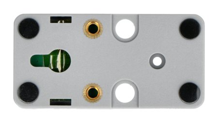 The gray unit m5stack expansion module lies upside down on a white background.