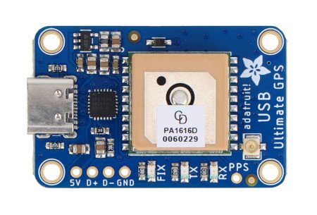 The ultimate gps gnss module lies on a white background.