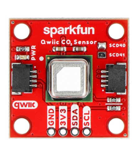 The red sparkfun temperature, humidity and co2 sensor lies on a white background.