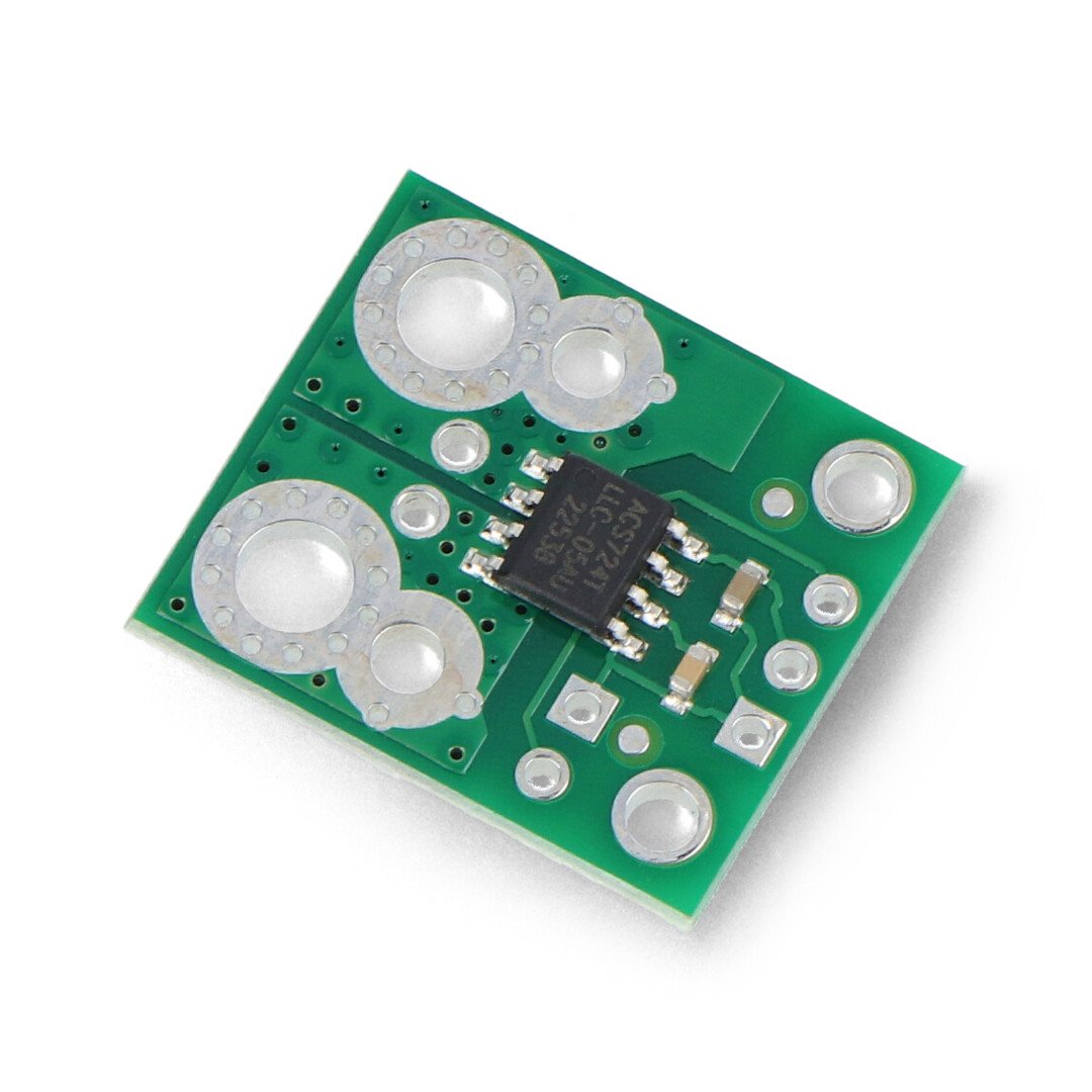 A green Pololu current sensor module lies on a white background.