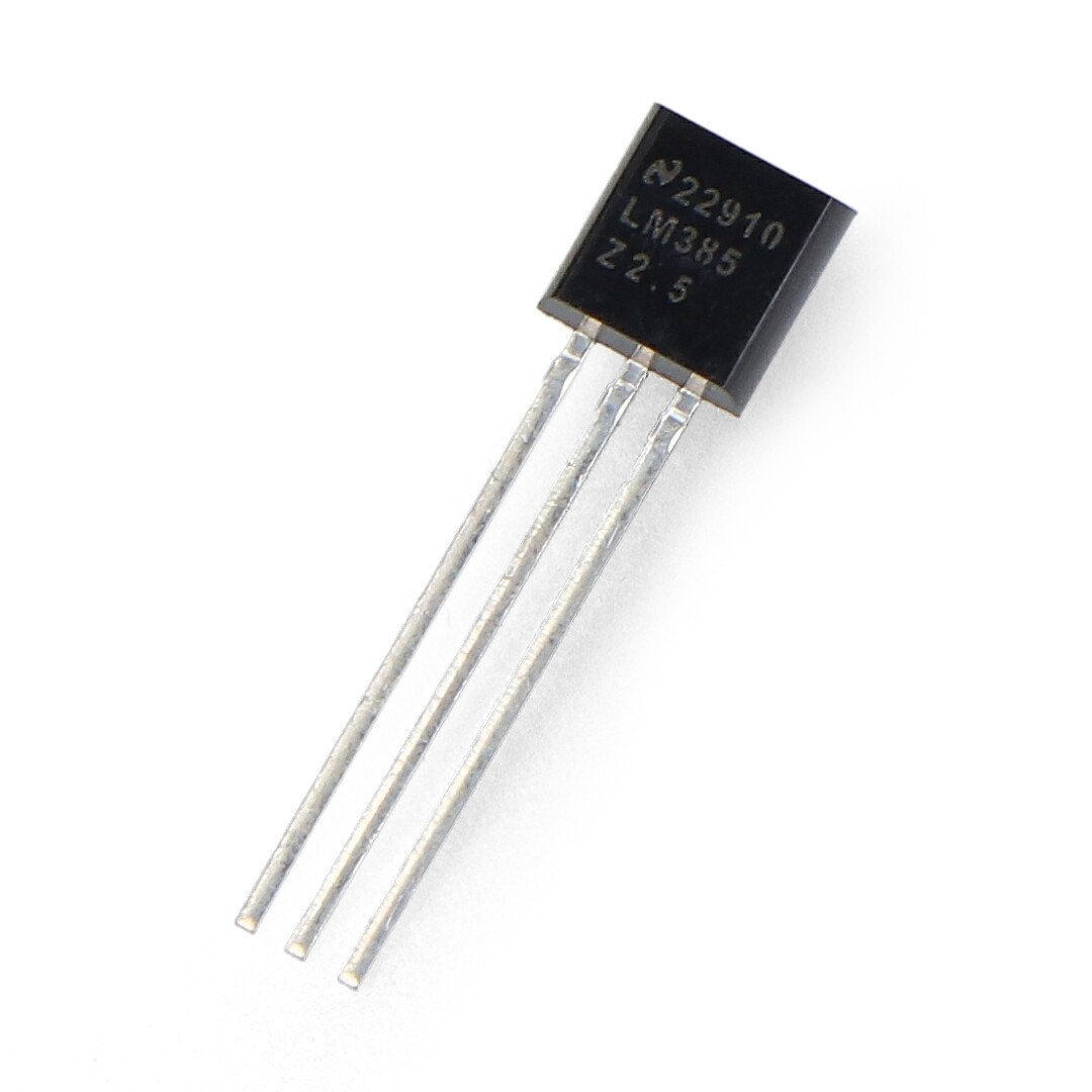 The reference voltage source integrated circuit lies on a white background.