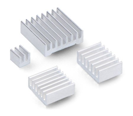 Four gray heat sinks lie on a white background.