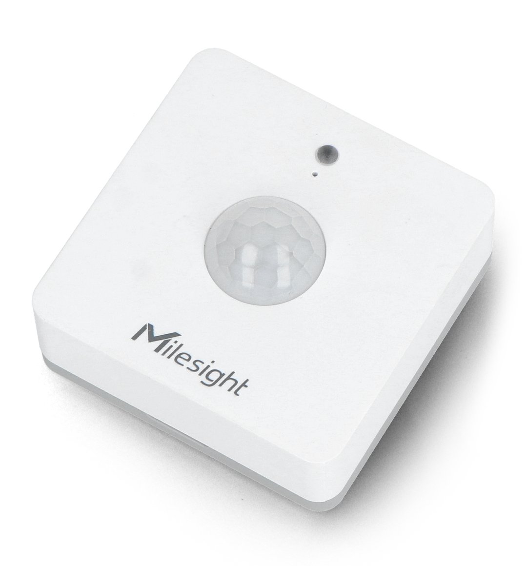 The Milesight light and motion sensor lies on a white background.