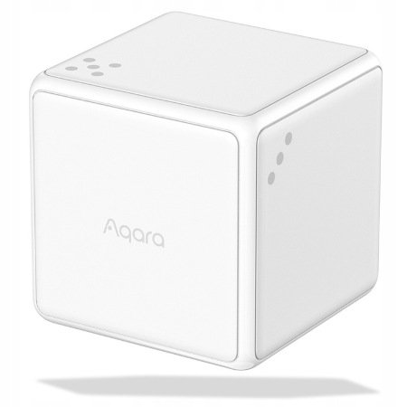 The white Aqara control cube lies on a white background.
