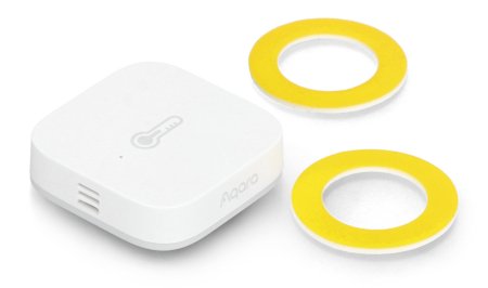 The white and smart temperature sensor lies on a white background along with two round and yellow mounting elements.