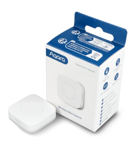 A white Aqara switch lies on a white background along with a box.