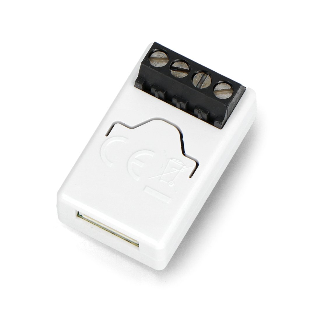 The Fibaro smart mini relay in white lies on a white background.